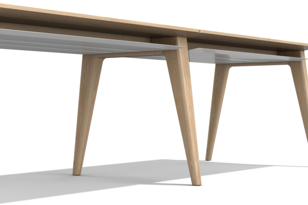 Detailaufnahme zeigt zwei Tische mit aneinander gestellten Tischbeinen aus Eichenholz die zu einer Form verschmelzen